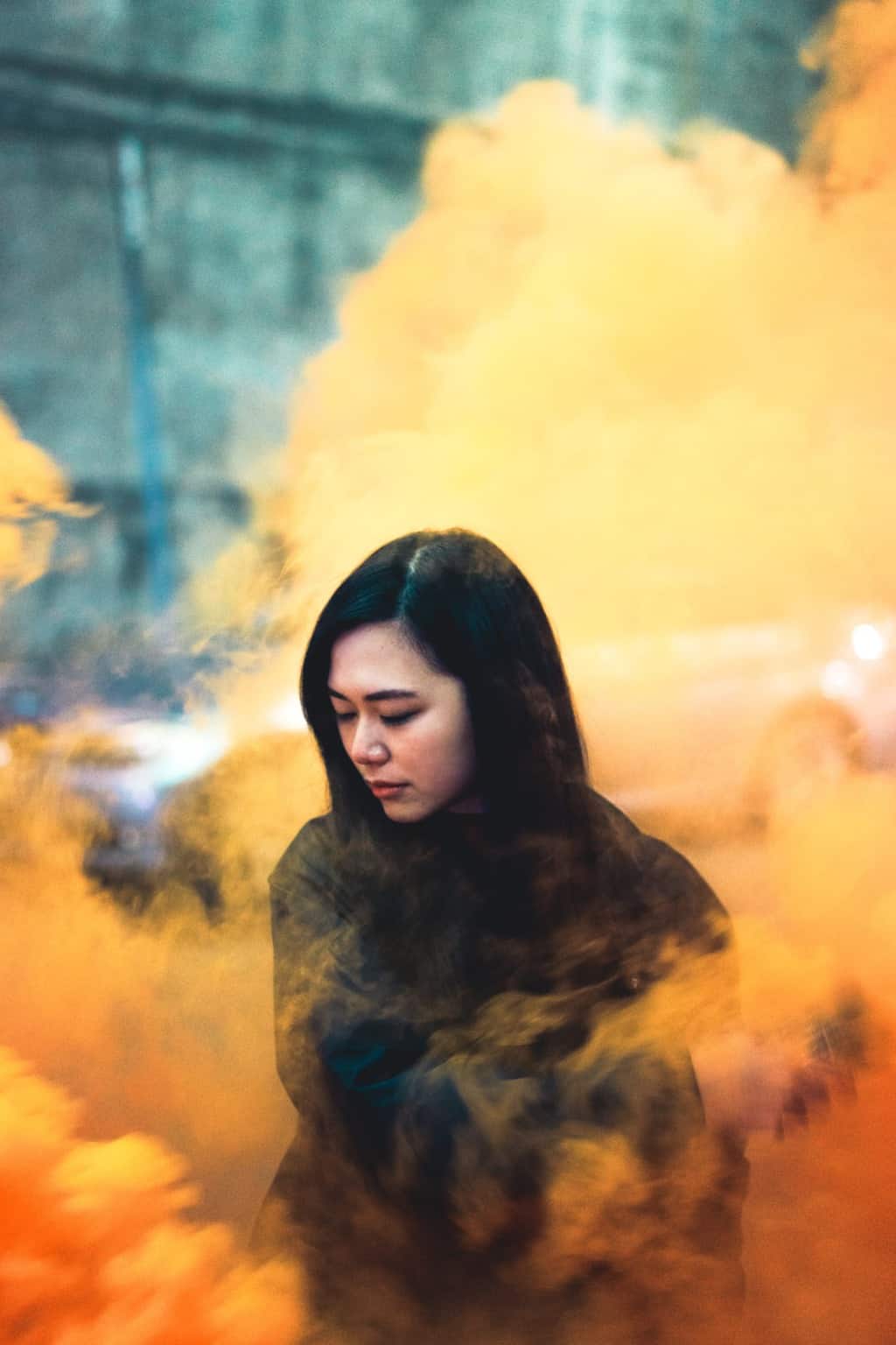 A Girl With Orange Baground Smoke